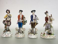 A group of four Dresden and other porcelain figures of musicians, 19th century, three modelled as
