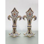 A pair of French faience vases each modelled as a fleur de lys, painted marks (a/f). 36.5cm