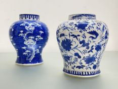 Two Chinese blue and white porcelain baluster jars: the first profusely painted with birds,
