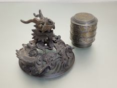 A Chinese brass-inlaid pewter stacking food box; together with a Chinese patinated bronze cover,