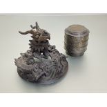 A Chinese brass-inlaid pewter stacking food box; together with a Chinese patinated bronze cover,