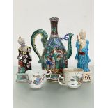 A group of Oriental ceramics comprising: a Japanese wine ewer, with dragon handle, decorated with