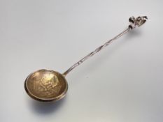A Romanov Dynasty Tercentenary commemorative spoon, the bowl with Imperial eagle and "1613-1913",