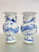 A pair of Chinese blue and white porcelain vases, of baluster form, each with six character mark