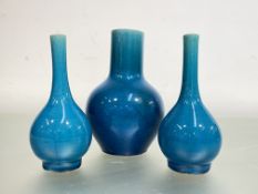 A Chinese turquoise glazed porcelain vase of bottle shape, with unglazed base; together with a