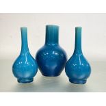 A Chinese turquoise glazed porcelain vase of bottle shape, with unglazed base; together with a