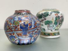 A Chinese baluster jar (lacking cover) painted in a famille verte / rose palette with figures,