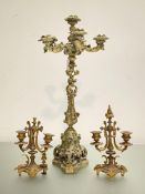 A 19th century bronze five light candelabrum, elaborately cast with acanthus leaves on a pierced
