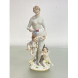 A Meissen porcelain group of Venus disarming Cupid, late 19th century, the Goddess modelled standing