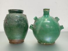 A French green-glazed terracotta flagon, spherical, with four handles and numbered "3"; together