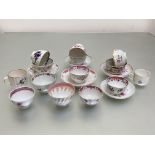 A collection of eleven English tea bowls, c. 1800, with five saucers, various factories including
