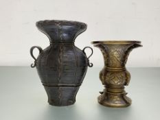 A Japanese patinated bronze basketweave vase, of flattened baluster form, with everted rim and