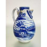 A Chinese Export blue and white chocolate pot, 18th century, of pear shape, the short spout with