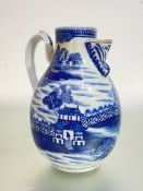 A Chinese Export blue and white chocolate pot, 18th century, of pear shape, the short spout with