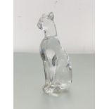Baccarat: a clear glass model of a seated big cat, engraved mark. Height 16cm