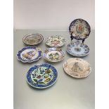 A group of Nevers, Quimper and other French faience plates, of various designs, three painted with