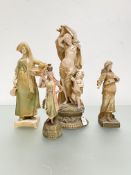 A group of four Austrian Art Nouveau figures of maidens, various factories including Royal