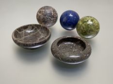 A group of three marble and hardstone spheres comprising: lapis lazuli, serpentine and a