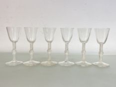 A set of six wine glasses in 18th century style, 20th century, with knopped twist stem and funnel