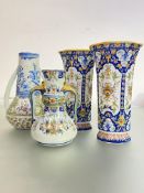 A group of Continental faience comprising: a pair of tall Rouen vases, of faceted cylindrical form