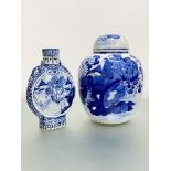 A Chinese blue and white porcelain baluster jar and (associated) cover, painted with birds by a