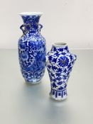 A Chinese blue and white porcelain twin-handled vase, of baluster form, densely painted with birds