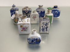 A group of 18th and 19th century tea cannisters and caddies comprising: three Delft examples (two