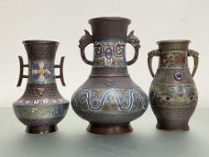 A group of Chinese enamelled bronze vessels in the Archaic style: the largest of baluster form, with