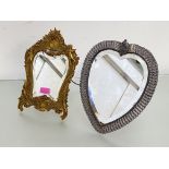A late 19th century gilt-metal easel mirror in the Rococo taste, the shaped bevelled plate within