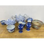 A mixed lot of blue and white china including two small boulster shaped vases with prunus decoration