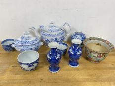 A mixed lot of blue and white china including two small boulster shaped vases with prunus decoration