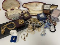 A quantity of costume jewellery including a Napier necklace measuring 18cm, a Past Times brooch,
