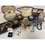 A quantity of costume jewellery including a Napier necklace measuring 18cm, a Past Times brooch,