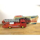 A mid 20thc Lift fire engine, made in Japan with original box measures 14cm x 37cm x 13cm