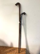 South Pacific walking stick with stylised fish carving to handle 104cm and a SE Asia walking stick