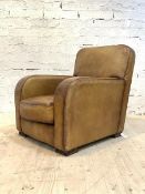 A Tetrad 'Eco' club armchair, upholstered in tan leather, with squab cushion, all raised on reeded