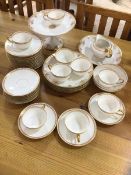 A Theodore Haviland Limoges tea set including eight tea cups, ten saucers, twelve side plates,