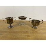 Two small silver trophies taller measures 6cm and glass jar with a silver top lacking a central