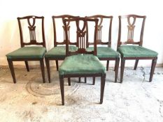 A set of five Edwardian inlaid mahogany dining chairs, with pierced splat back over upholstered