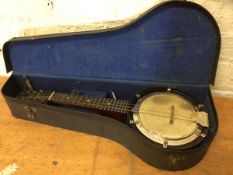 A miniature banjo in original travelling hard case, measures 52cm