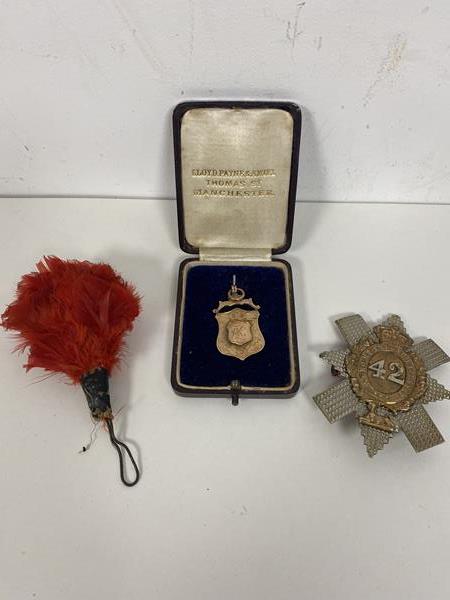 A 9ct gold medal inscribed verso Presented to Lance Corporal Wyatt First Blackwatch Regiment by R