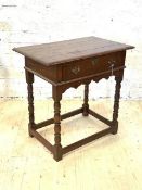 A Walnut lowboy in the 18th century style, the rectangular plank top over frieze drawer and shaped