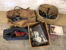 Fishing Interest:- A collection of fishing reels, a wicker creel, flies etc (a lot)