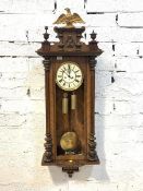 A Victorian Gustav Becker walnut cased Vienna regulator wall clock, the case with gilt egal surmount