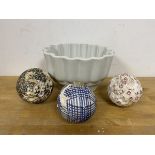 A set of three 19thc carpet boules a/f measure 8cm diameter and a jelly mould (4)