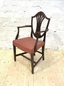 An early 20th century Hepplewhite style carver dining chair, with upholstered seat and square