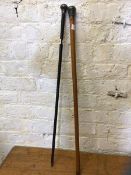 A malacca walking stick with white metal knop, measures 92cm and another walking stick ebonised with