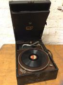 An HMV travelling gramophone measures 14cm x 42cm x 29cm