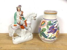 A Poole pottery baluster shape vase with foliate and bird polychrome decoration, measures 25cm