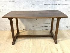 A 19th century vernacular fruitwood trestle table, the rectangular moulded three plank top with